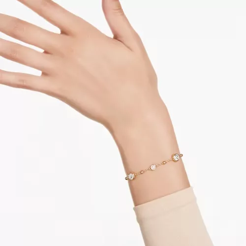 Swarovski női karkötő – arany tónusú bevonat, fehér kristályokkal