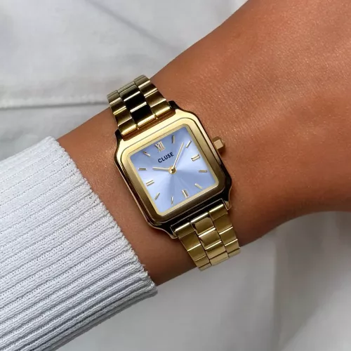 CLUSE Gracieuse Petite női karóra lila számlappal arany acélcsaton 24 mm kézen