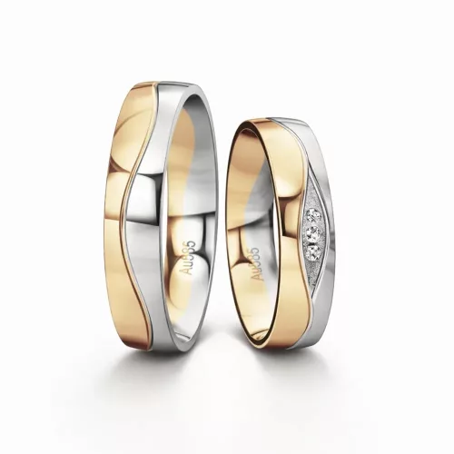 Vörös-fehér arany hullámos karikagyűrű pár