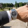 Festina Swiss F20100/5 férfi karóra fekete karbonmintás számlappal kézen